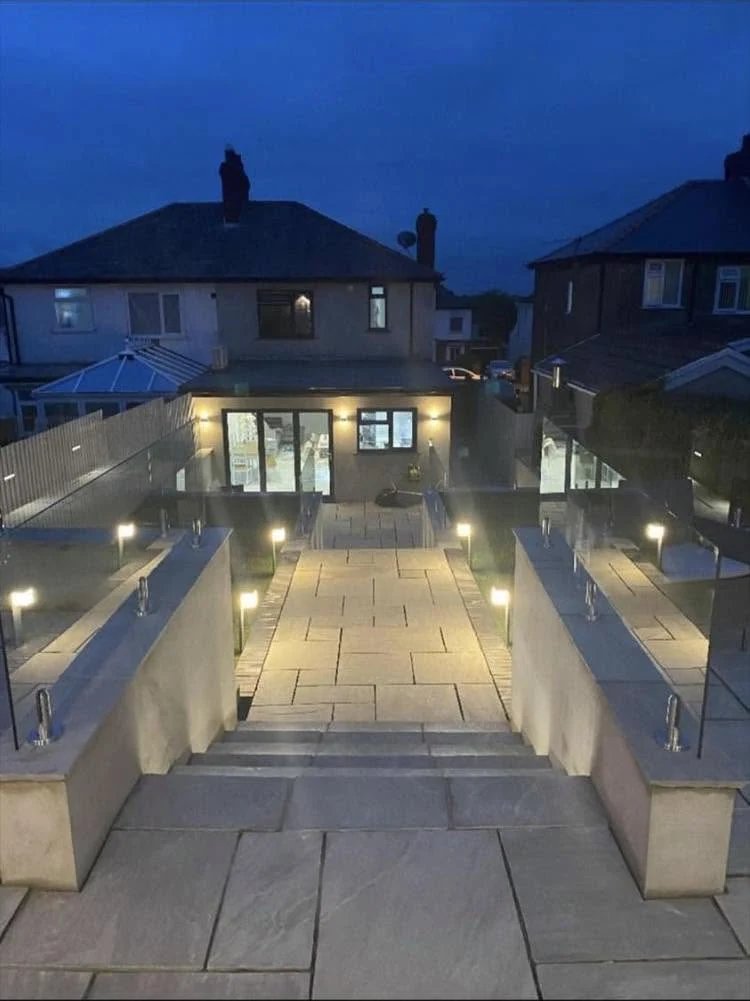 outdoor-glass-balustrade-twilight-terrace-steps-farnham-farnham-glass-balustrades Outdoor glass balustrade on garden terrace steps, evening light, Farnham